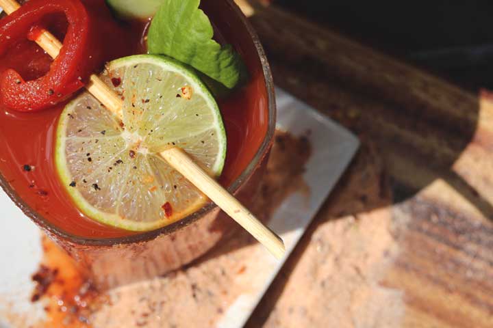 Bloody Mary with Sriracha Salt, Lime and Roasted Red Pepper Garnish