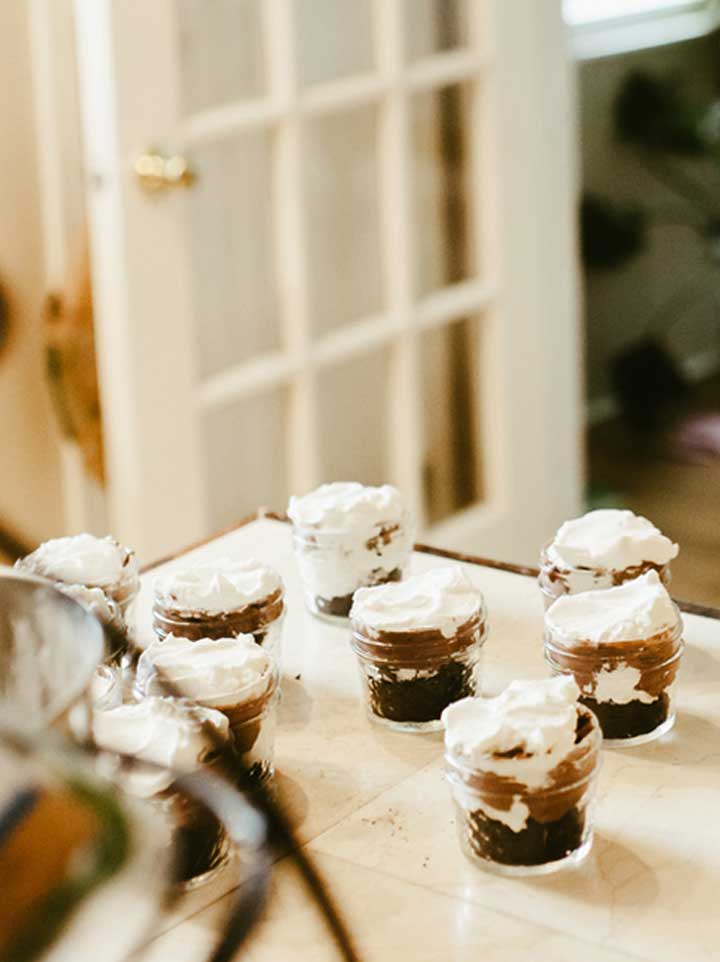 finished jars of death by chocolate cream pie on counter