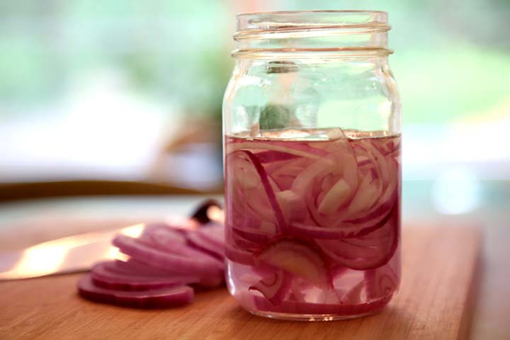 Sliced Red Onions in jar