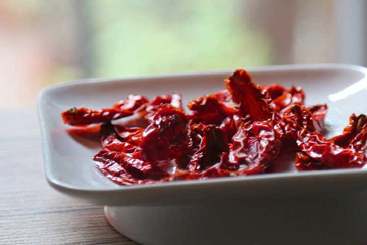 Sun dried tomatoes by window